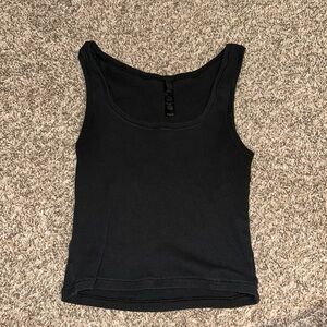 Black skims tank